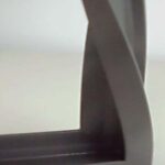A fusion welded corner withstands twisting a full 360 degrees without failure.